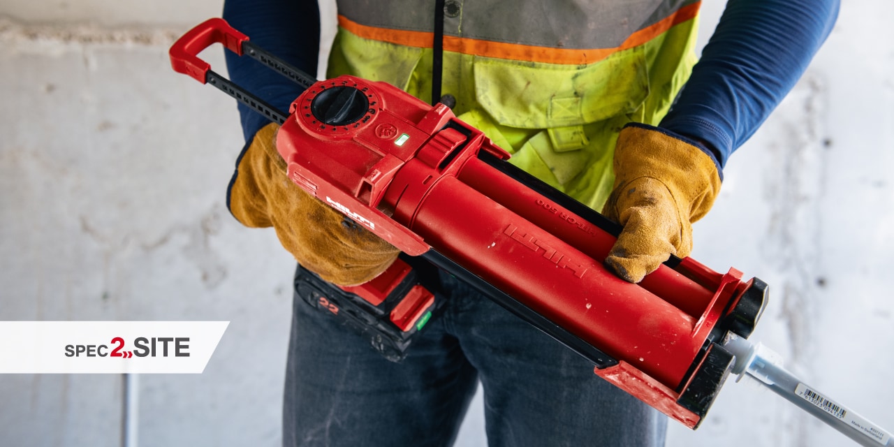 a worker uses a cordless dispenser